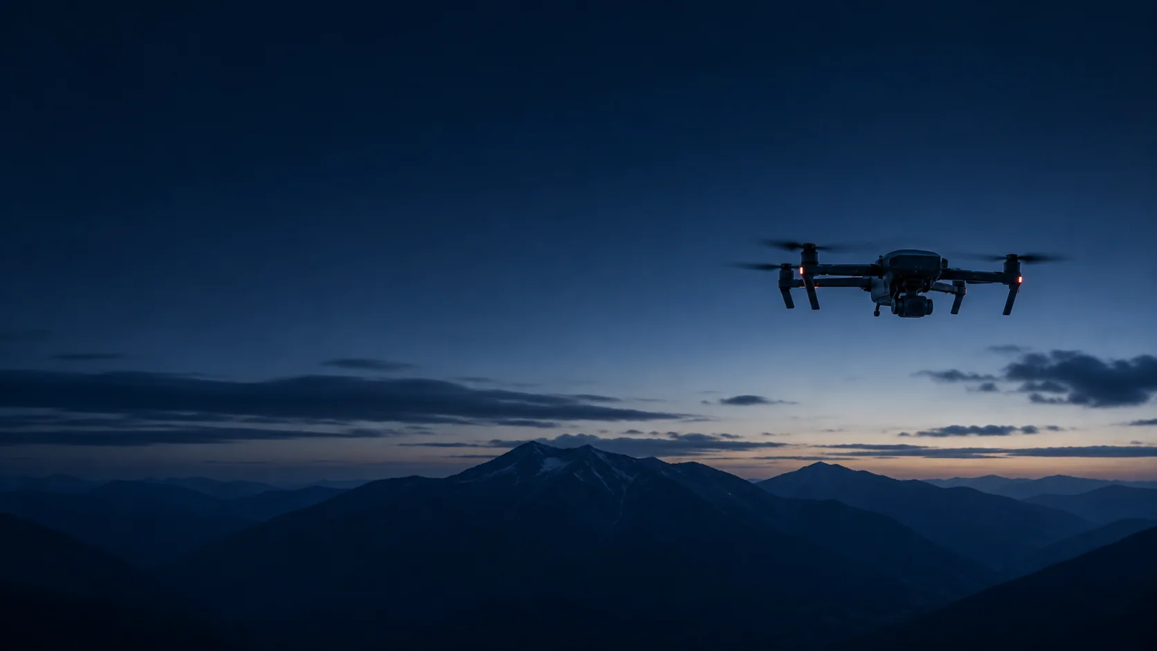 Drone flying over a mountain landscape